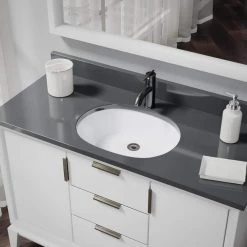 Rene Undermount Porcelain Bathroom Sink in White with Pop-Up Drain in Antique Bronze